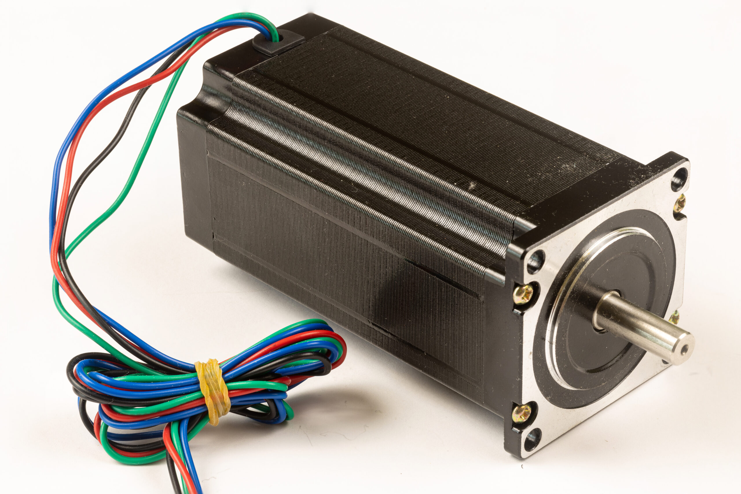 CNC microsteping stepper motor isolated above white background.